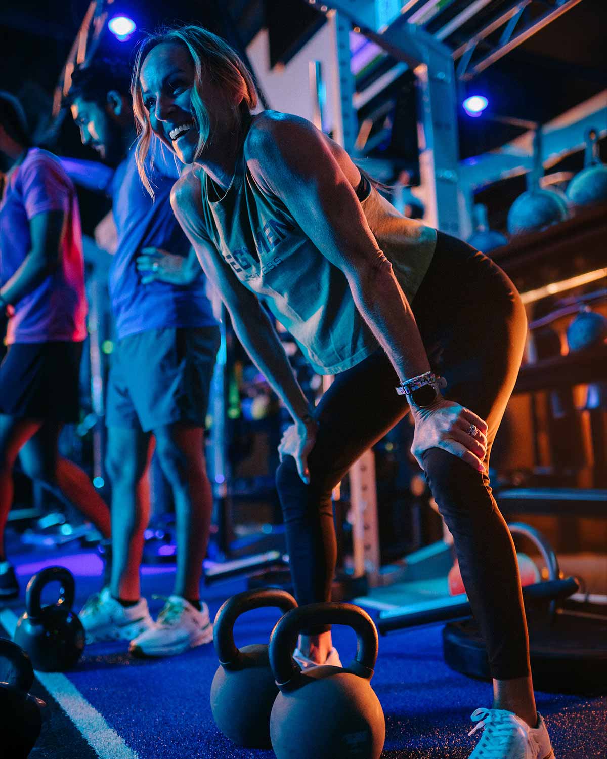 Head Coach Emily Wong catching her breath between sets at Regymen Fitness Ascension