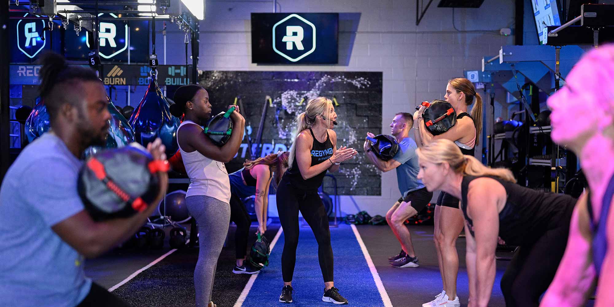 Head Coach Emily Wong leading a full workout at Regymen Fitness Ascension in Gonzales, Louisiana